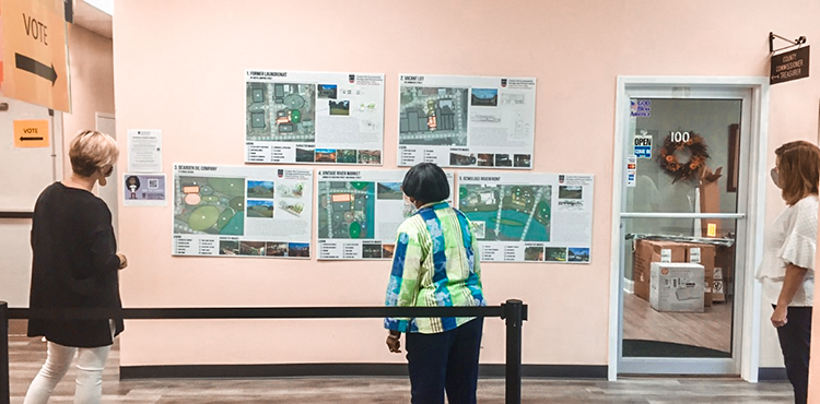 Hawkinsville residents look at design charrette ideas for a brewpub in downtown Hawkinsville.