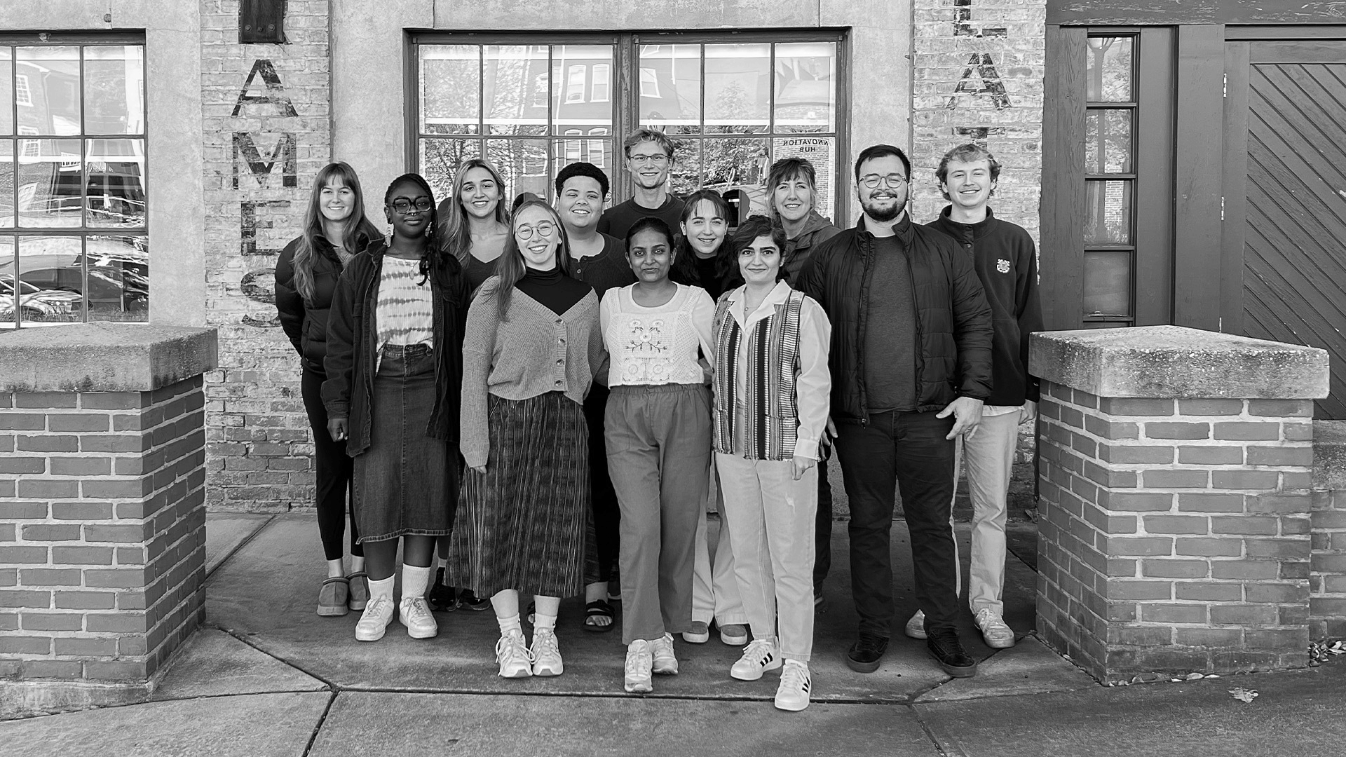 "Ideas of Community and Place" students pose before the CED's Tanner Building.