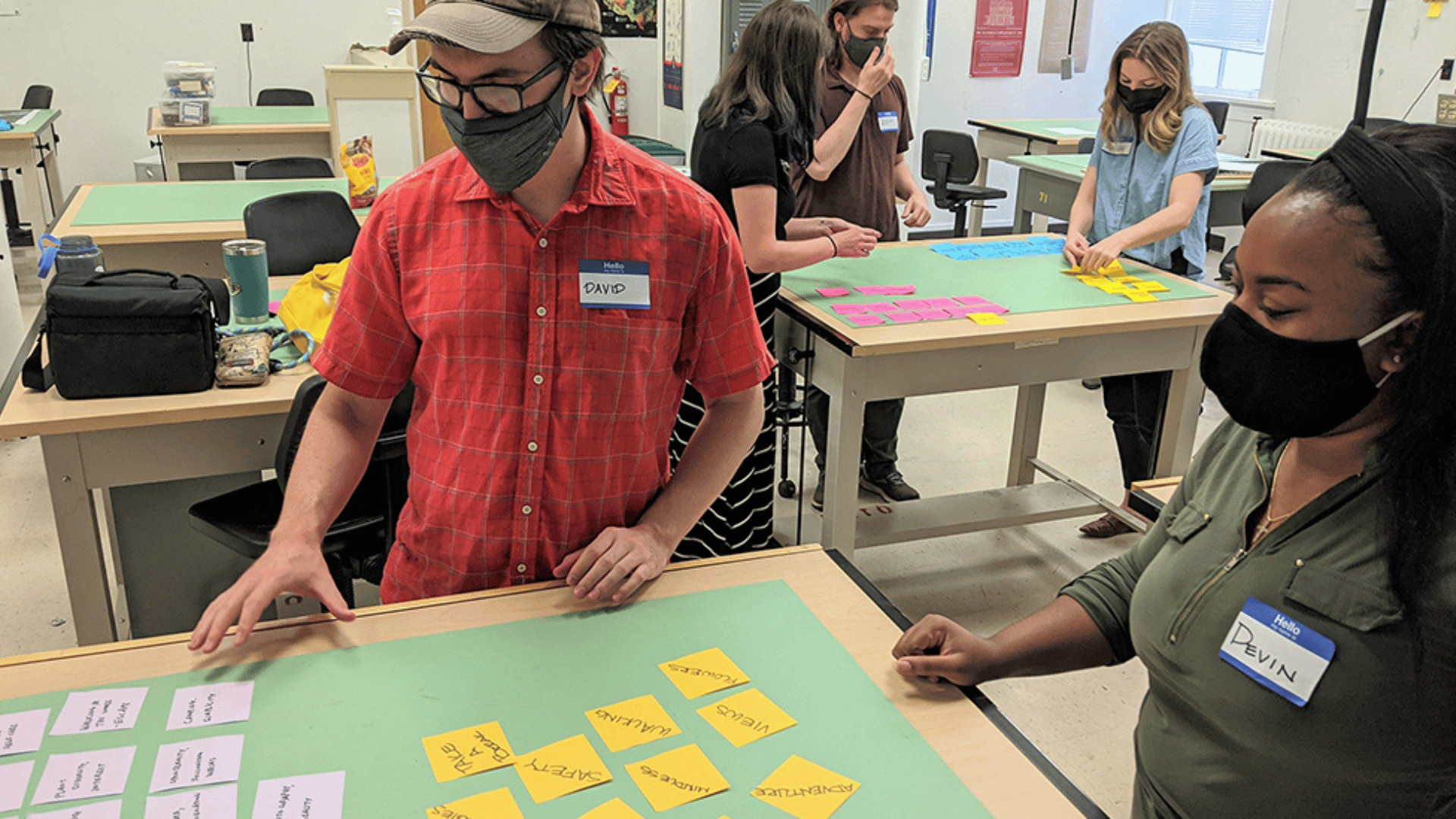 College of Environment and Design (CED) students (L-R) David Evans, Freja Carlson, Row Jerles, Natalie Glaze and Devin Butler participate in a brainstorming exercise to during a virtual charrette held on campus. (Credit: Jennifer Lewis)