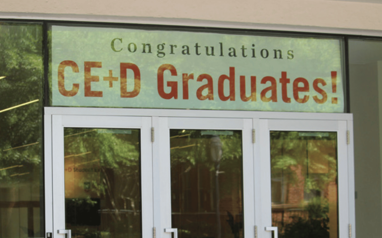 2017 CED Graduation banner hangs above doors at UGA.