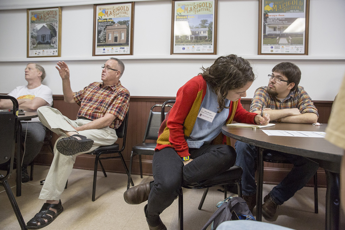 Mike Shockley, a retired Athens Policeman, gives his opinion of a topic as Grace Barrett, a geography major, and Jacob Schindler, a landscape architecture major, take notes and listen.Credit: Peter Frey, University of Georgia