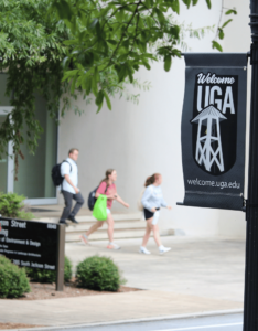 Detail shot of the Welcome UGA sign outside of the Jackson Street Building.