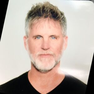 Portrait of Albert Harris, Brand Development Manager for mmcité USA & Canada, wearing a black shirt and looking at the camera.