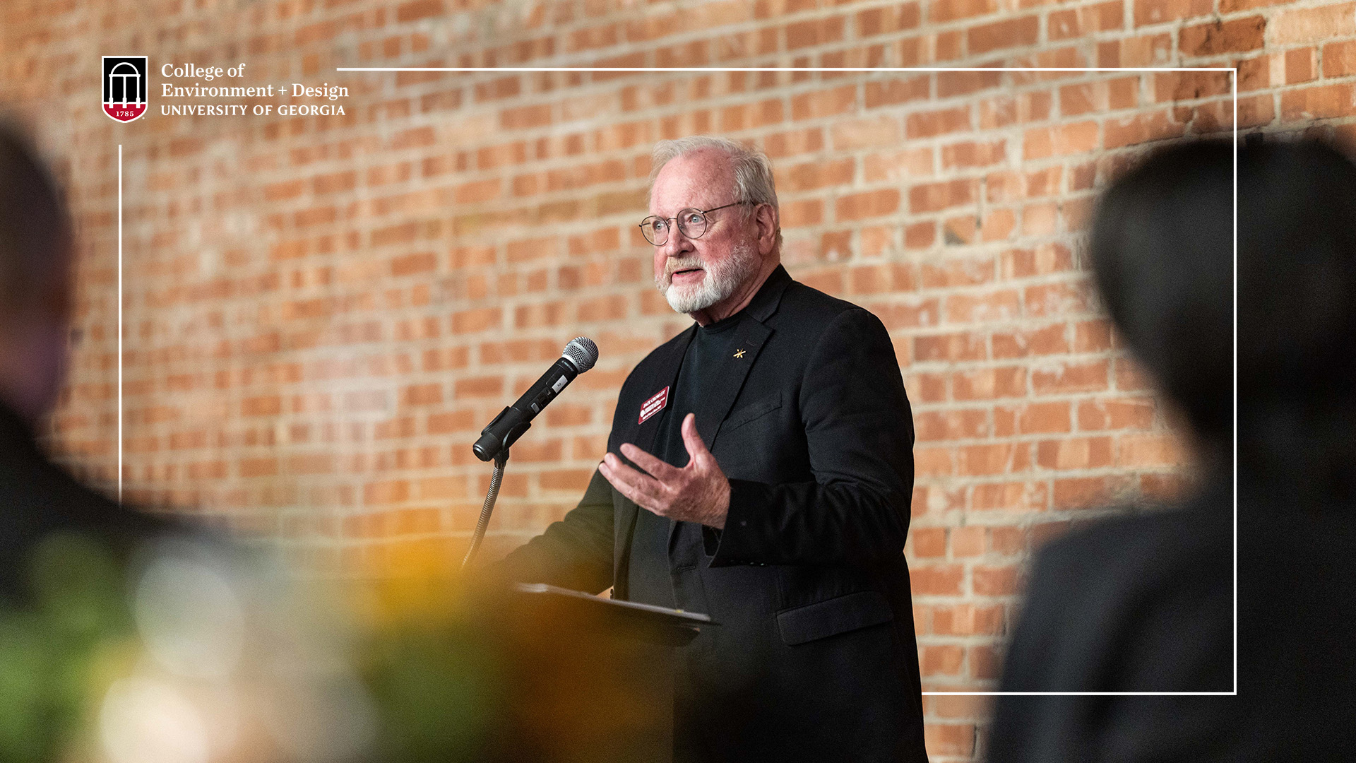 Image of Jack Crowley speaking at a podium at the OU Gibbs College of Architecture Hall of Fame Induction Ceremony.
